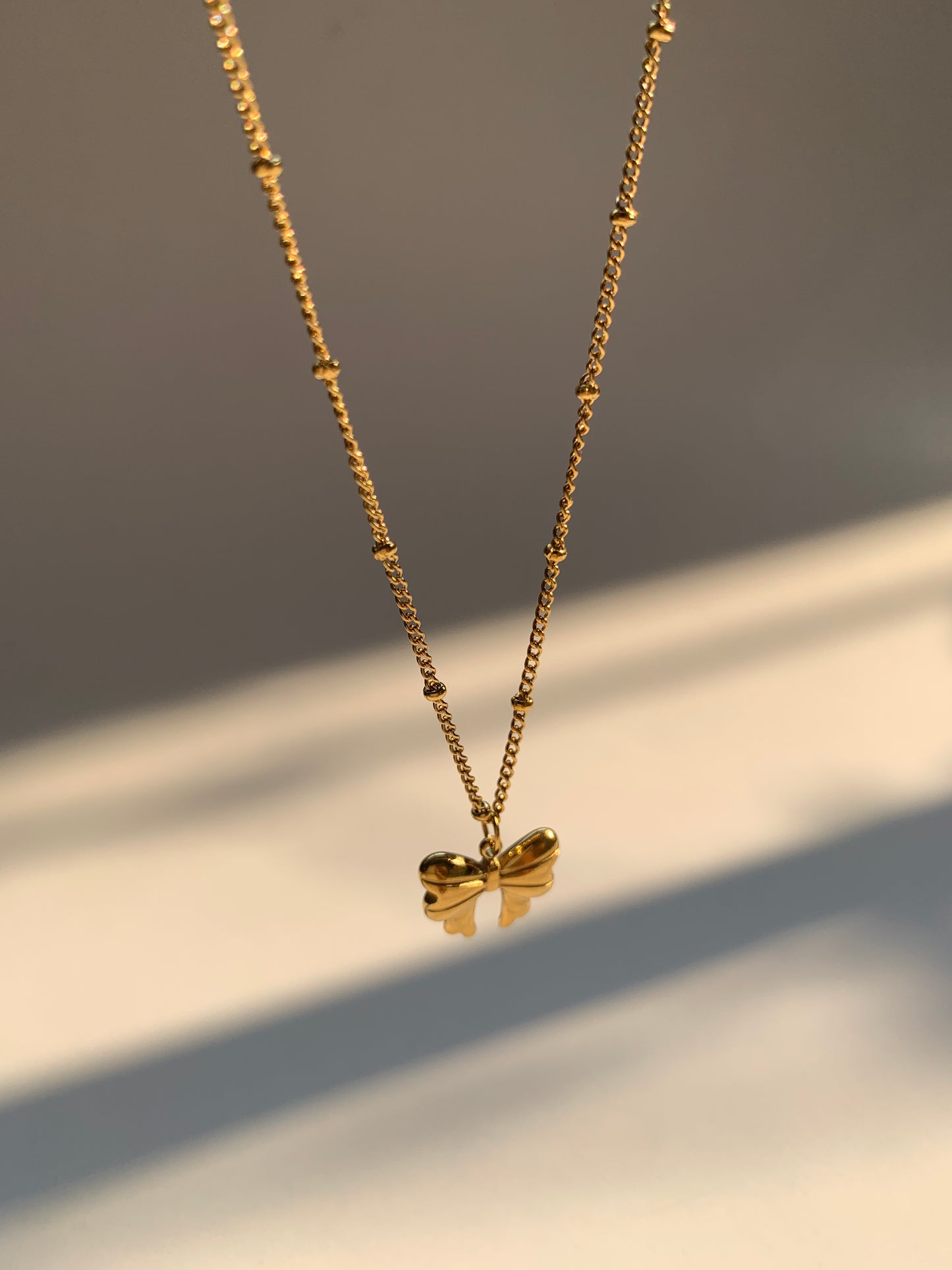 Coquette bow necklace